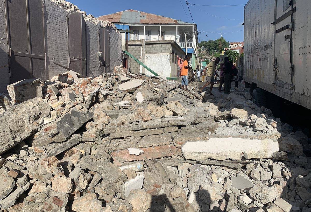 Rubble fills a street near Saint-Louis du Sud, Haiti, on Saturday, Aug. 14, 2021. (JCOM Haiti v ...