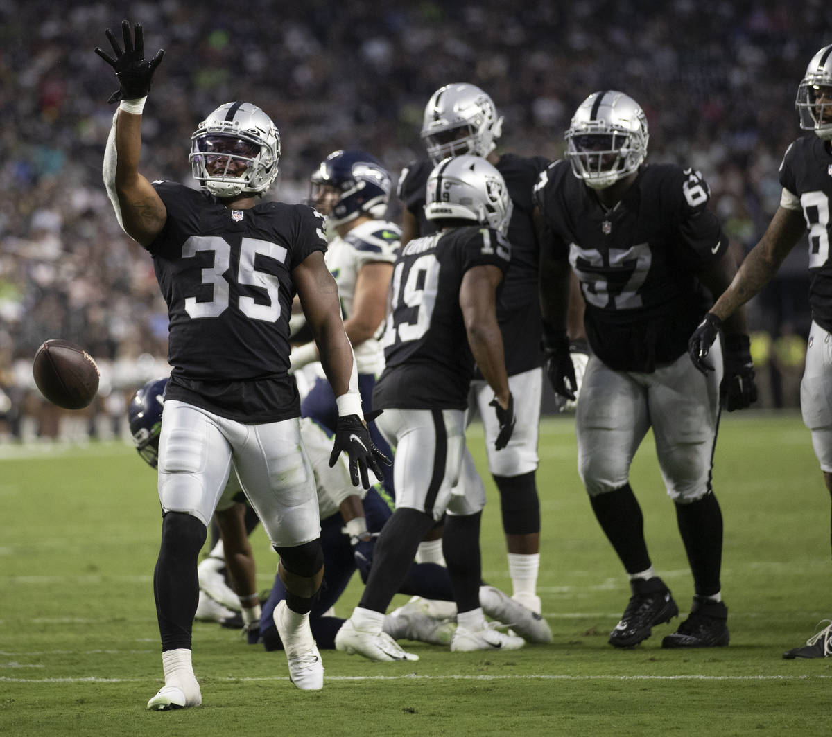 Raiders running back BJ Emmons (35) celebrates a big run in the second quarter during an NFL pr ...