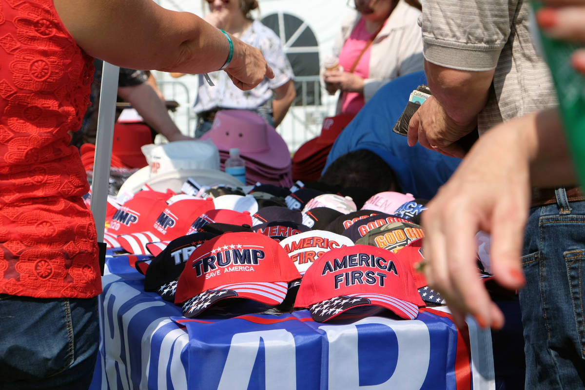 Hats and other items featuring former President Donald Trump on sale at the 6th annual Basque F ...