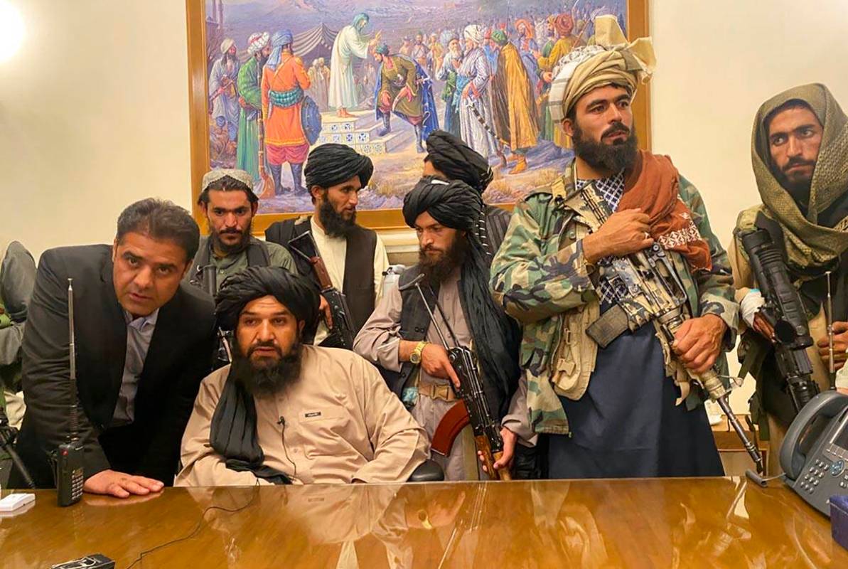 Taliban fighters take control of Afghan presidential palace after the Afghan President Ashraf G ...