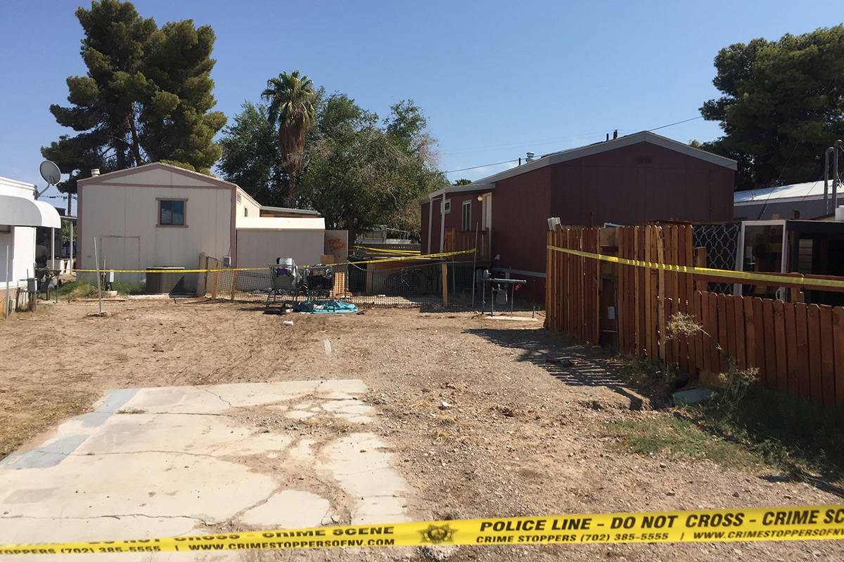 Police investigate a homicide Sunday, Aug. 15, 2021, on the 1100 block of South Mojave Road in ...