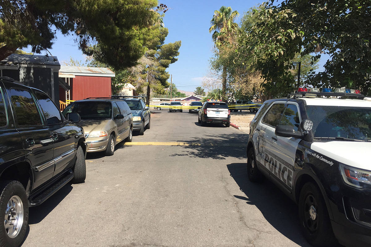 Police investigate a homicide Sunday, Aug. 15, 2021, on the 1100 block of South Mojave Road in ...