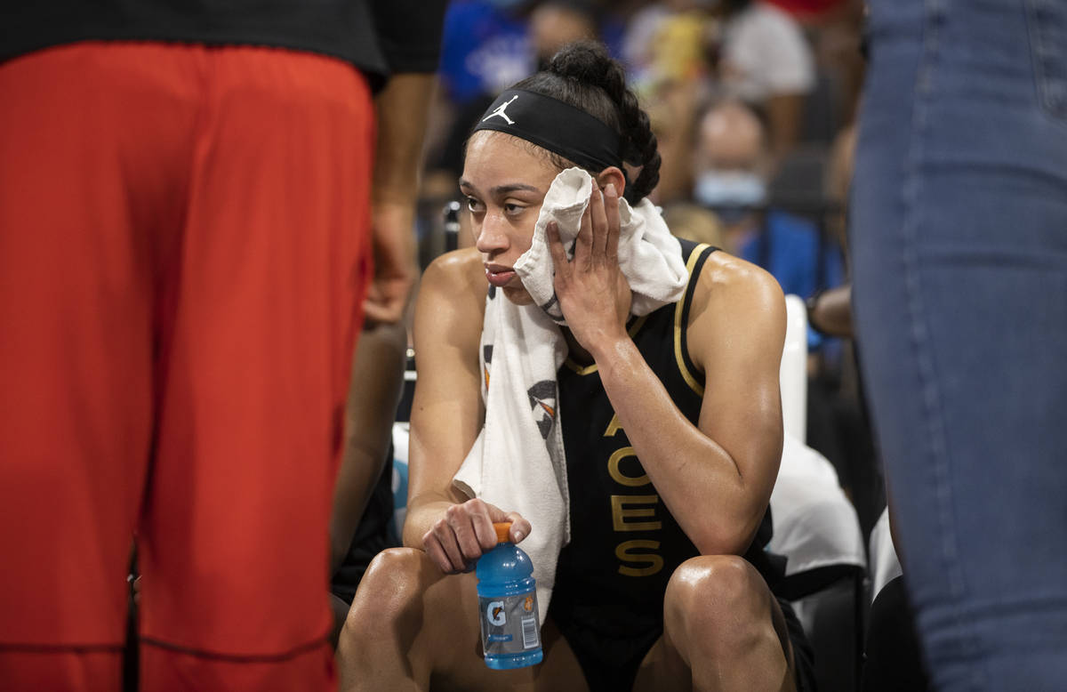 Las Vegas Aces forward Dearica Hamby (5) sits on the bench during a timeout in the second quart ...