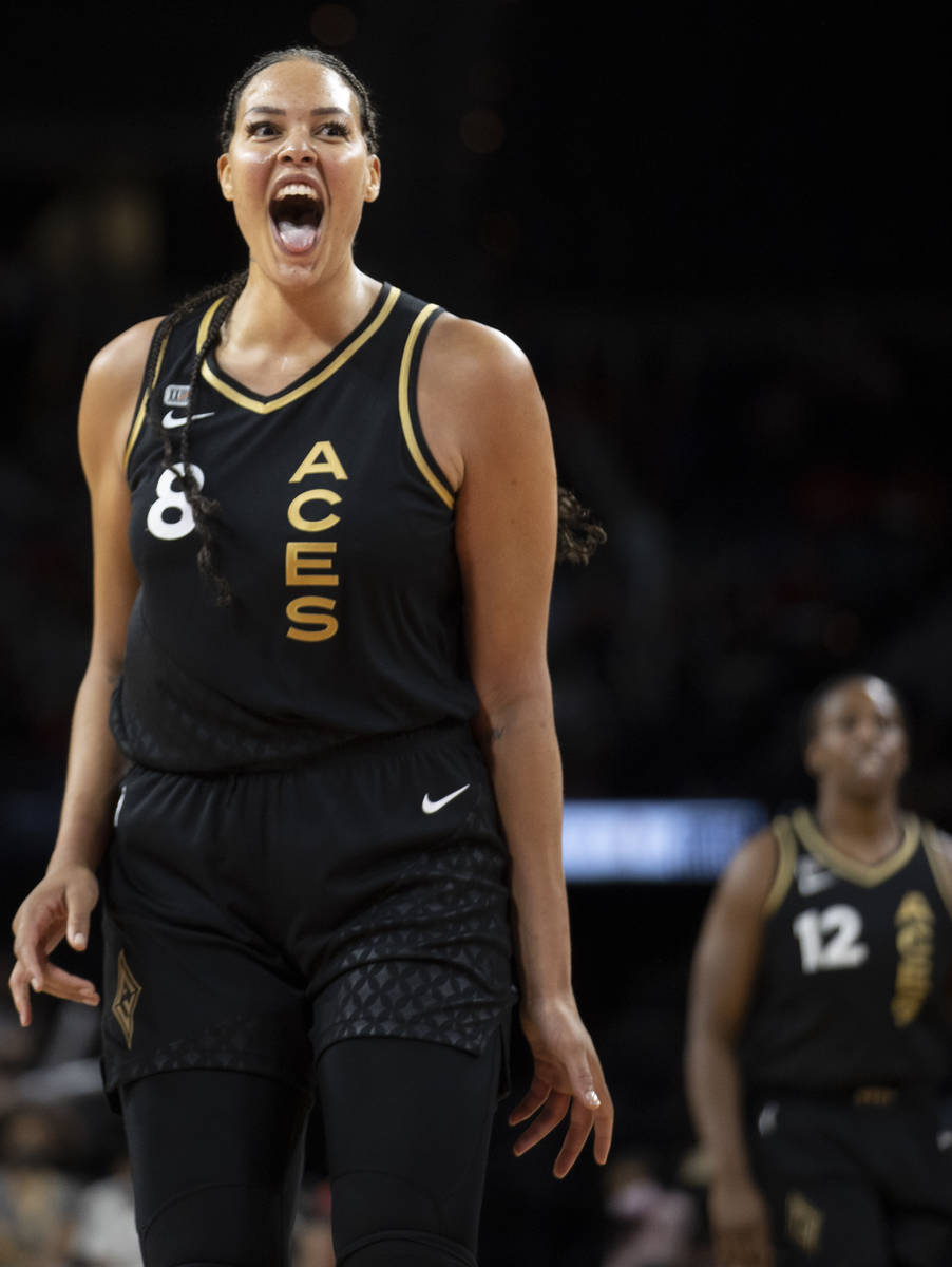 Las Vegas Aces center Liz Cambage (8) celebrates after scoring in the fourth quarter during a W ...