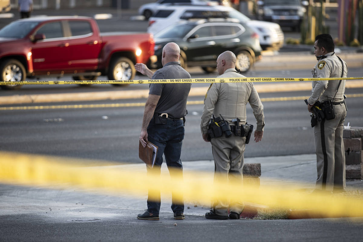 Las Vegas Metropolitan Police investigate a homicide at East Charleston Boulevard and South Mar ...