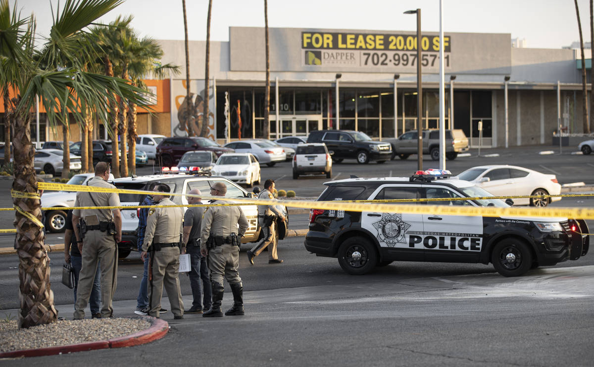 Las Vegas Metropolitan Police investigate a homicide at East Charleston Boulevard and South Mar ...