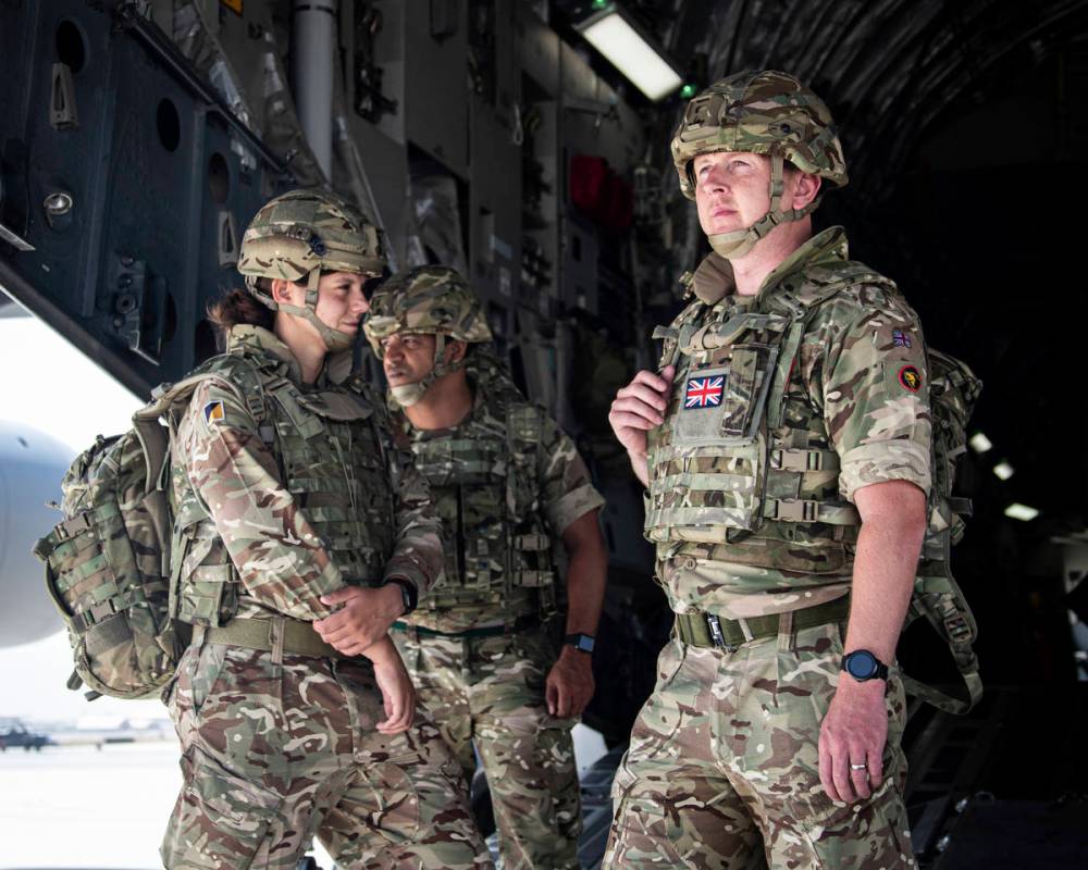 In this photo provided by the Ministry of Defence on Sunday, Aug. 15, 2021, members of the 16 A ...