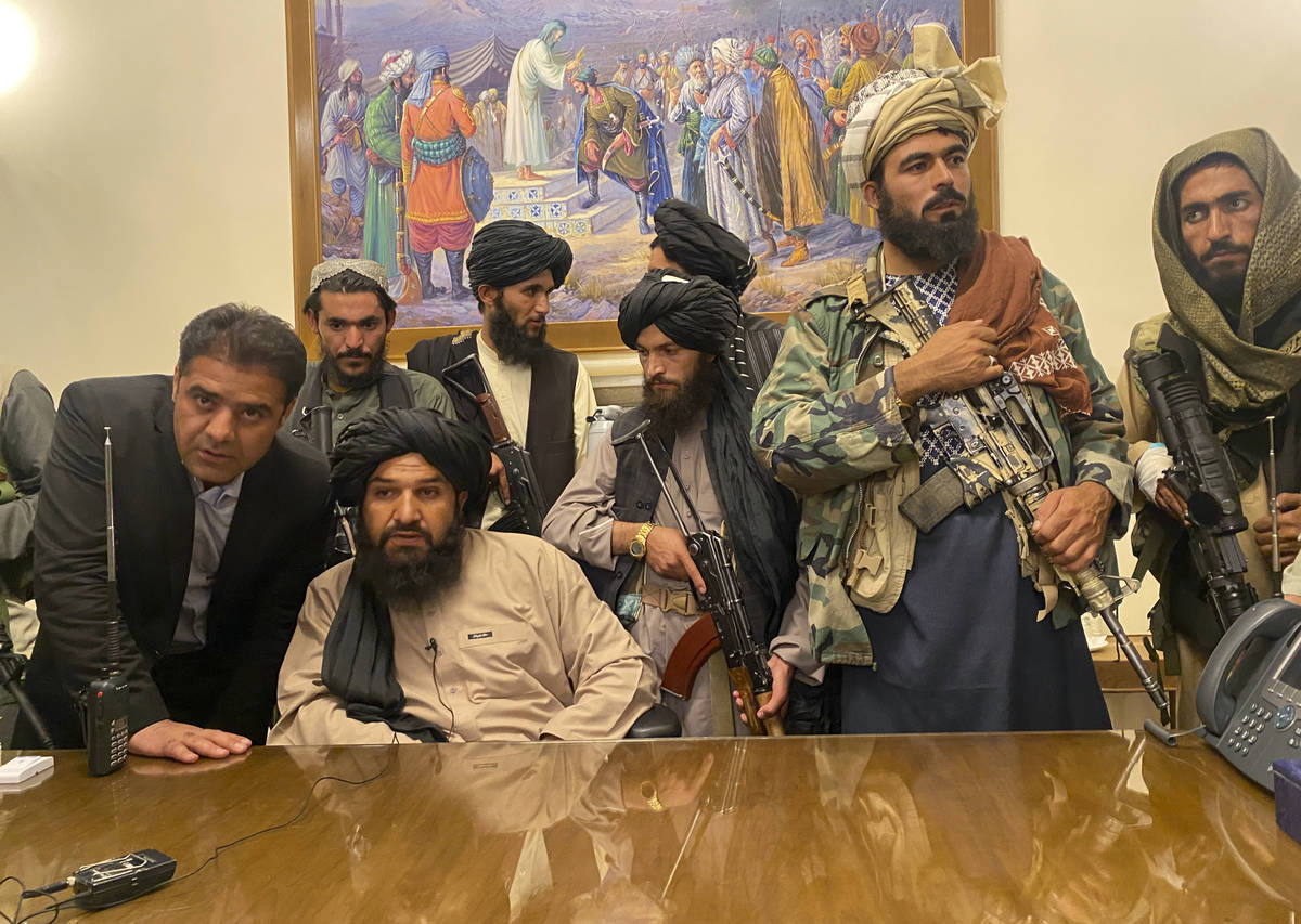 Taliban fighters take control of Afghan presidential palace after the Afghan President Ashraf G ...