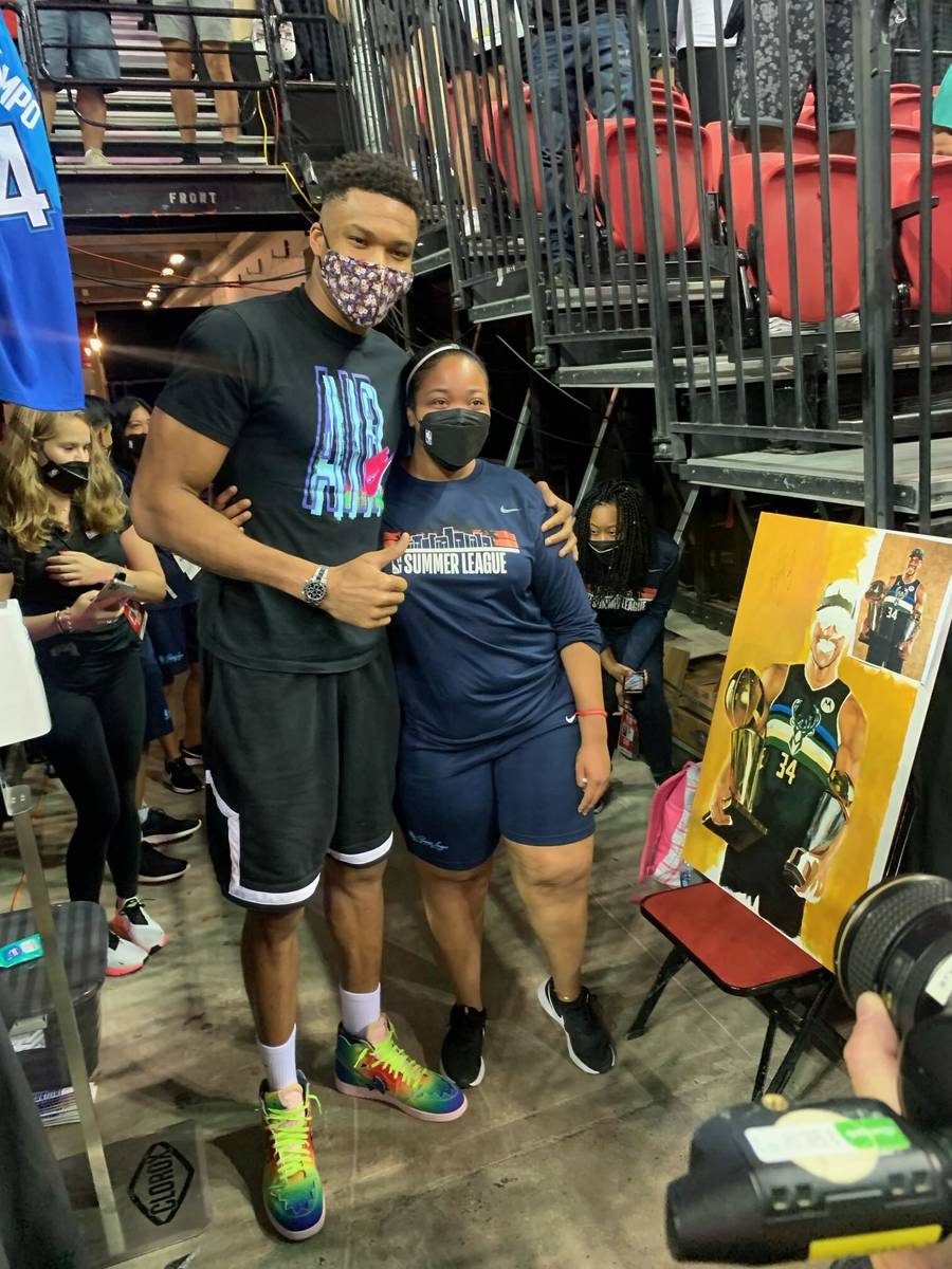 Keely Jackson poses for a photo with Milwaukee Bucks forward and reigning NBA Finals MVP Gianni ...
