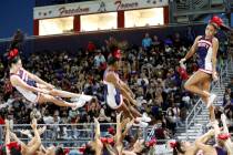 Liberty High School cheerleaders perform during the first half of a football game against Arbor ...