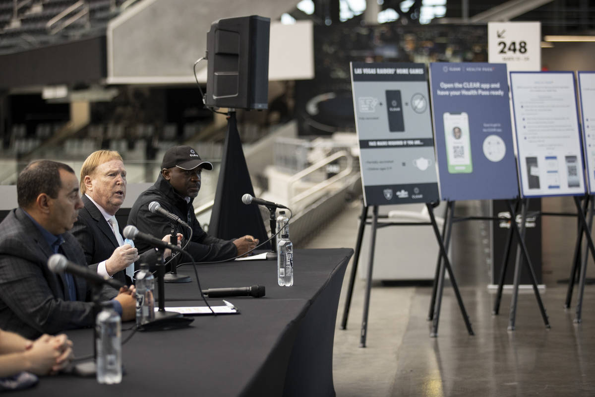 Las Vegas Raiders president Dan Ventrelle, from left, owner Mark Davis, and CLEAR'S senior vice ...