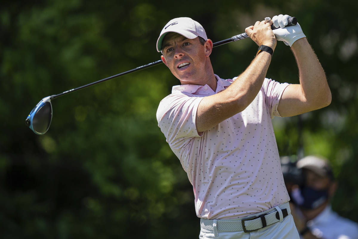 Rory McIlroy tees off on the seventh hole during the fourth round of the Wells Fargo Championsh ...