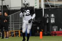 Oakland Raiders linebacker Te'Von Coney (56) runs on the field during the NFL team's training c ...