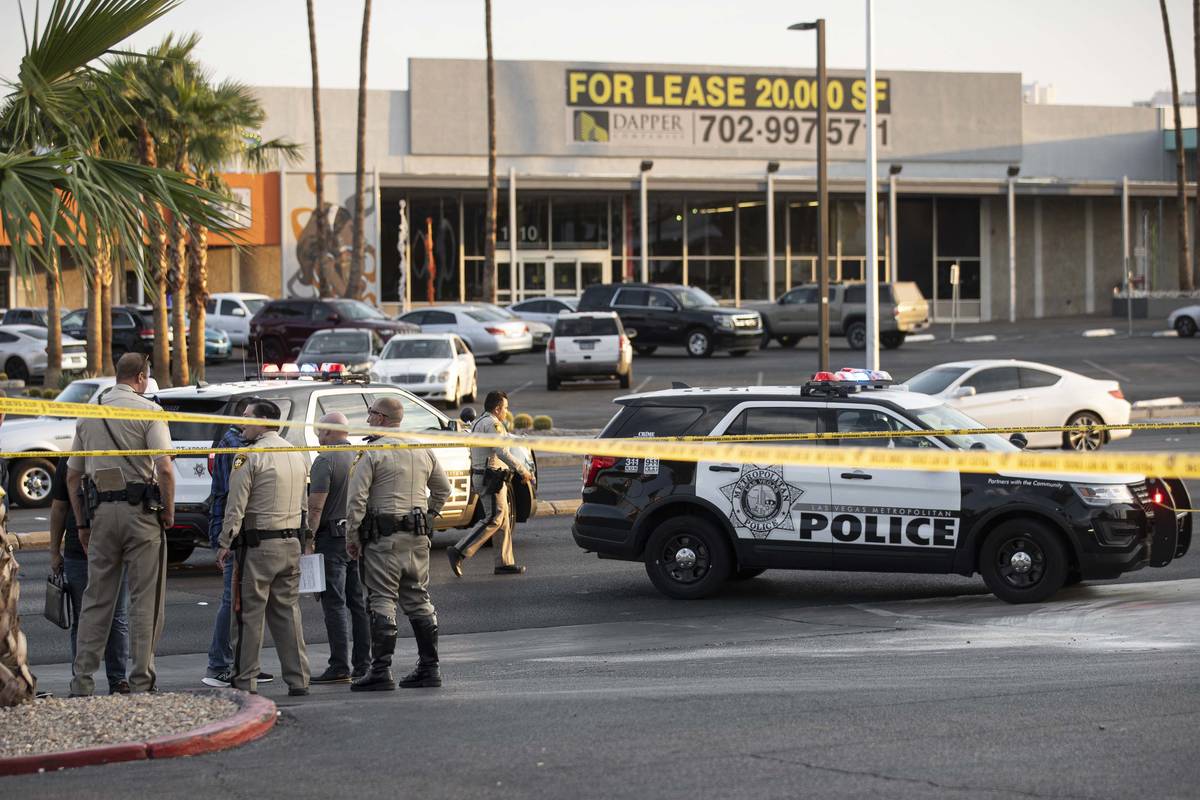 Las Vegas Metropolitan Police investigate a homicide at East Charleston Boulevard and South Mar ...