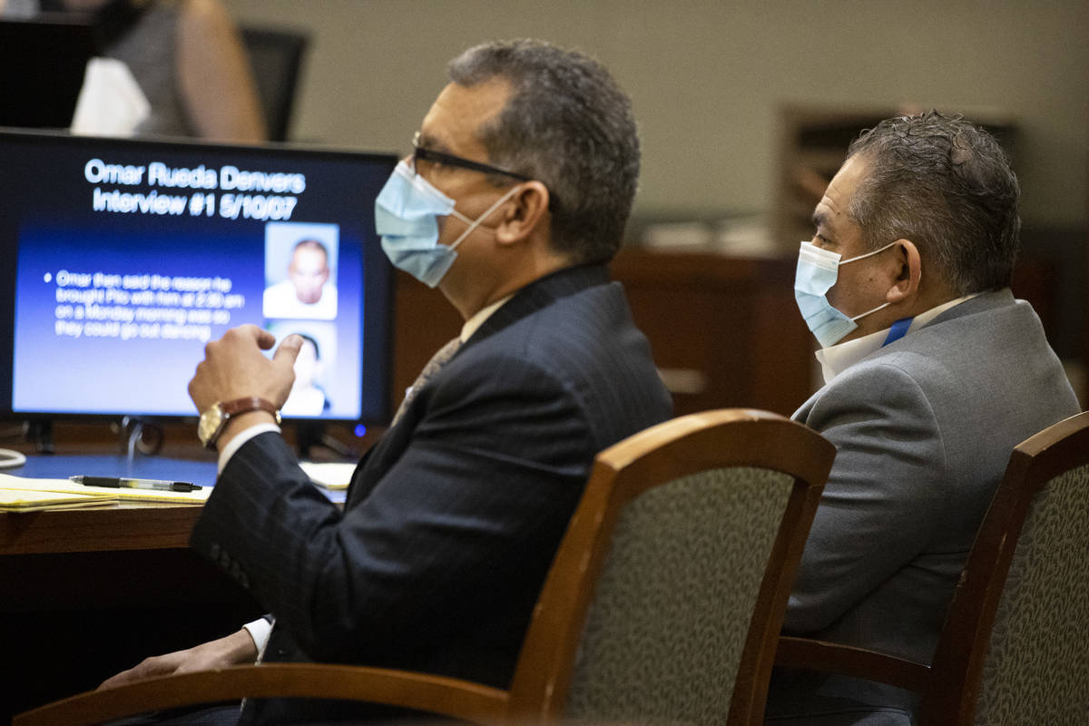 Defense attorney Christopher Oram, left, listens to the prosecution's opening statements with h ...