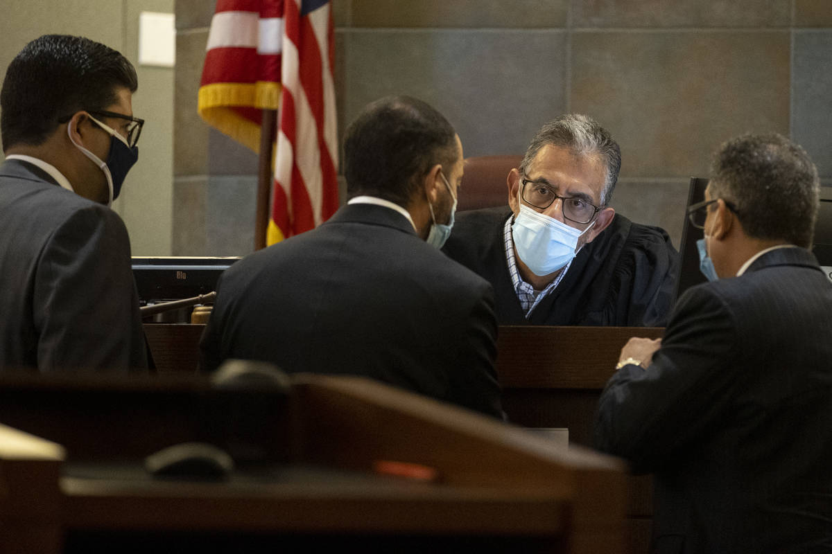 District Judge Michael Villani speaks to attorneys in the retrial of Omar Rueda-Denvers at the ...