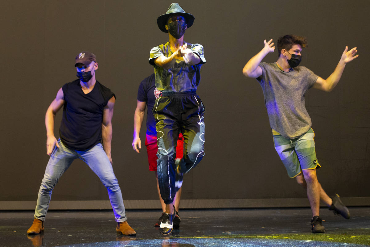 Performers rehearse for Michael Jackson One by Cirque du Soleil in the show's theater at Mandal ...