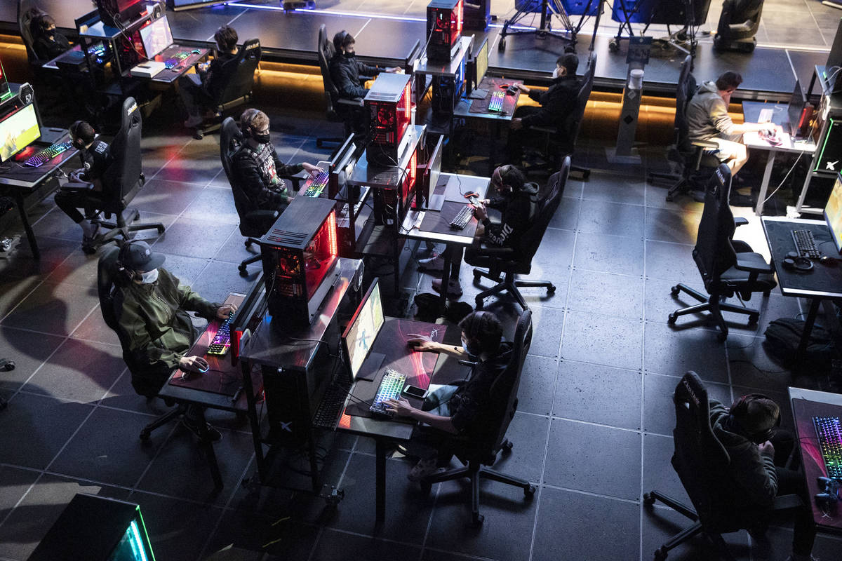 Players compete during the Fortnite tournament "Friday Night Frags" at the HyperX Esports Arena ...