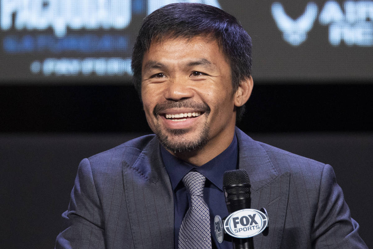 Manny Pacquiao participates during a press conference at the MGM Grand Garden Arena in Las Vega ...