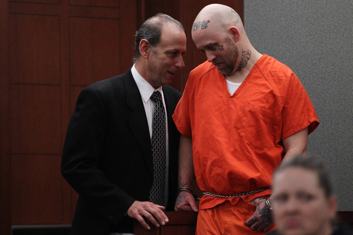 Bayzle Morgan, right, with his attorney Dan Bunin, appears for a court hearing at the Regional ...