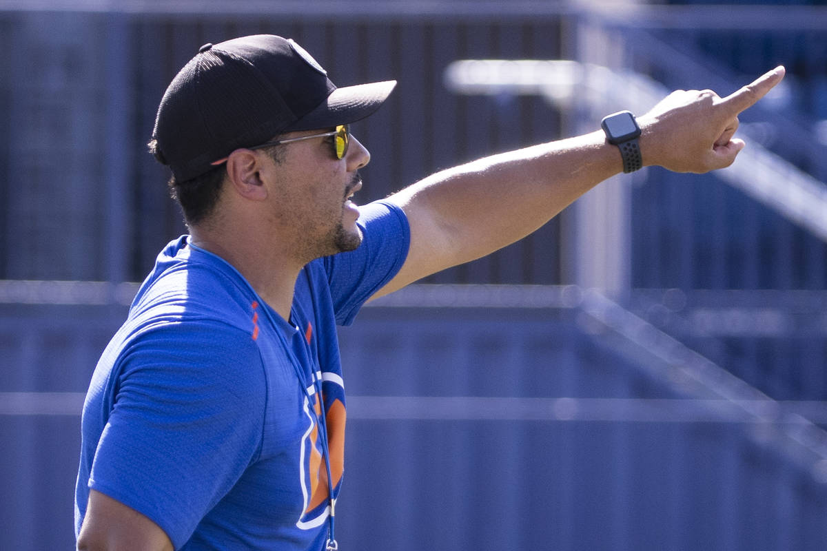 Bishop Gorman High School head coach Brent Browner directs his players during teamÕs pract ...