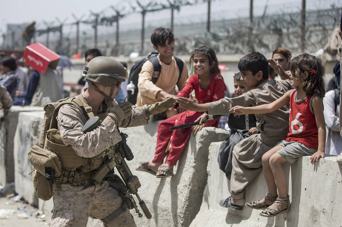 In this image provided by the U.S. Marine Corps, a Marine with Special Purpose Marine Air-Groun ...