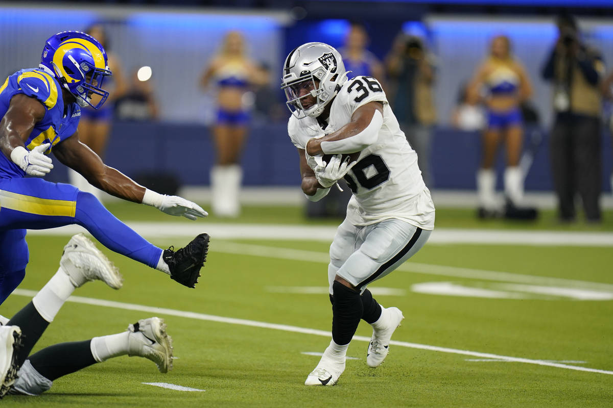 Las Vegas Raiders running back Trey Ragas runs for a touchdown during the first half of a prese ...