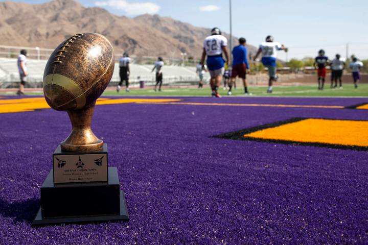 The "Air Space Showdown" trophy is posed as the Sunrise Mountain High School varsity ...