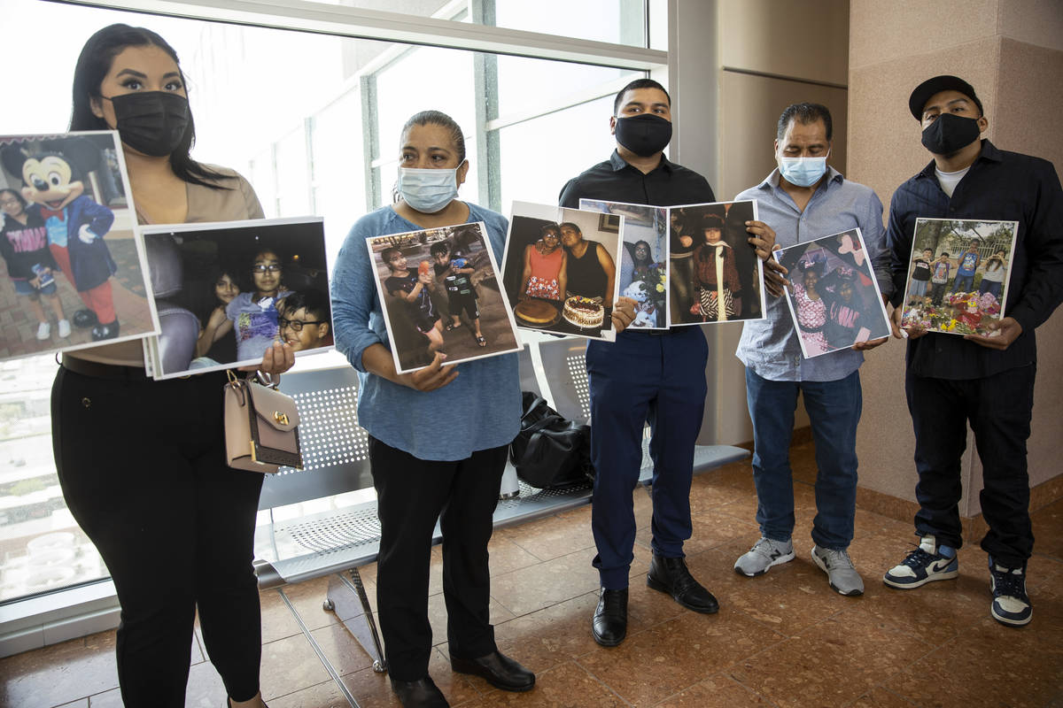 Encarnacion Espana, second from left, mother of 11-year-old Jazmin Espana, who was struck and k ...