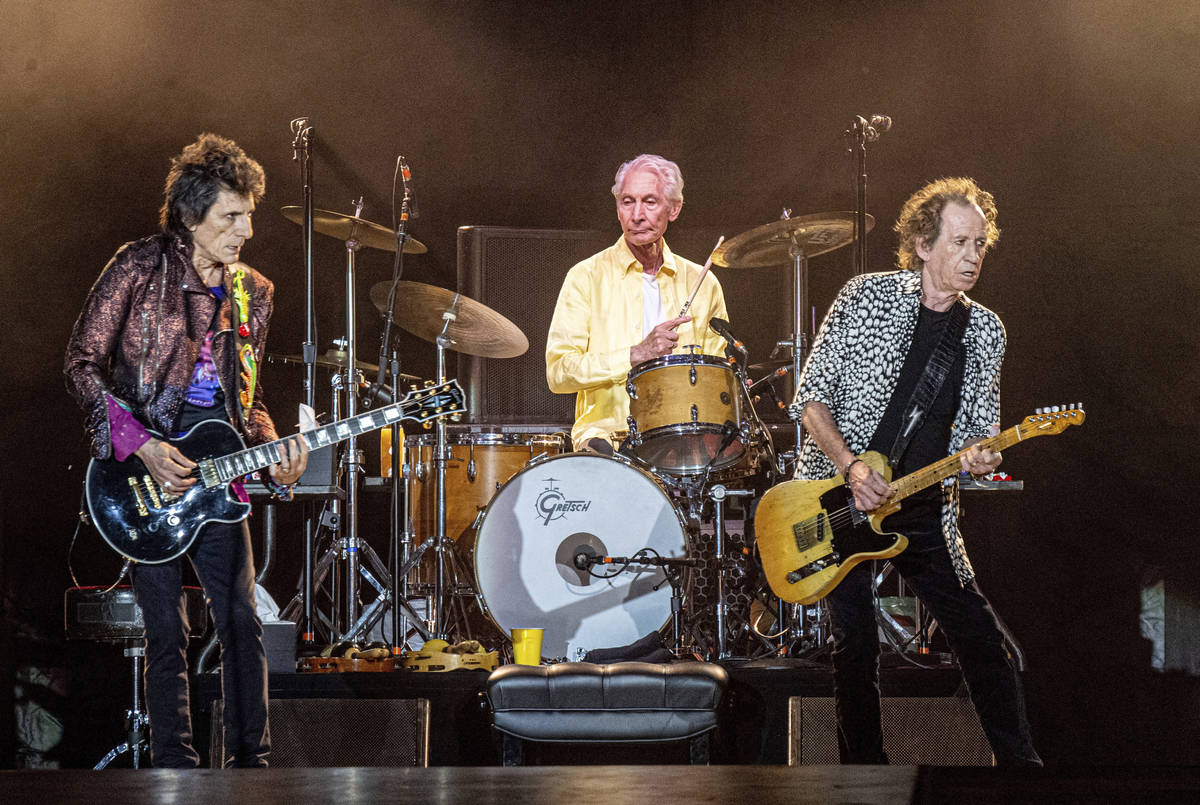 FILE - Ronnie Wood, from left, Charlie Watts and Keith Richards of The Rolling Stones perform o ...