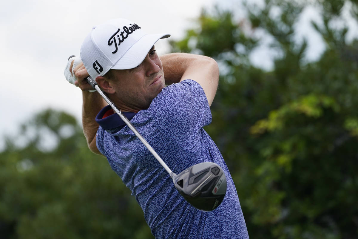 Justin Thomas tees off on the third hole in the final round at The Northern Trust golf tourname ...