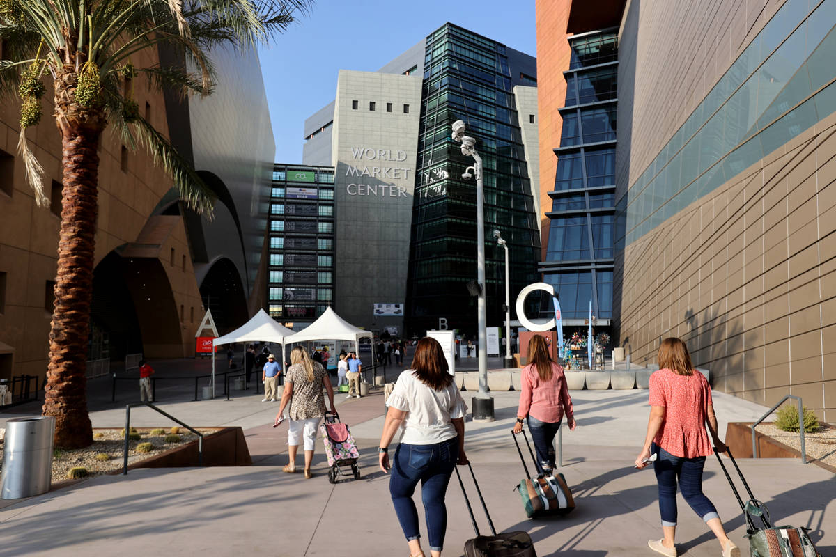 Conventioneers arrive for the Las Vegas Market home furnishings and decor show at the World Mar ...