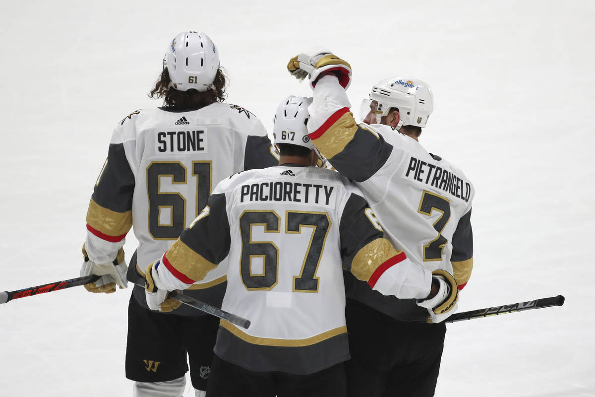 Vegas Golden Knights right wing Mark Stone (61), left wing Max Pacioretty (67) and defenseman A ...