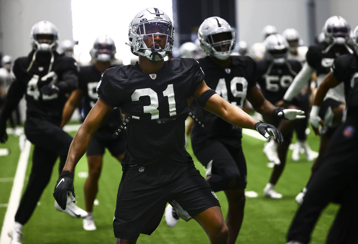 Raiders cornerback Isaiah Johnson warms up during training camp at Raiders Headquarters/Intermo ...