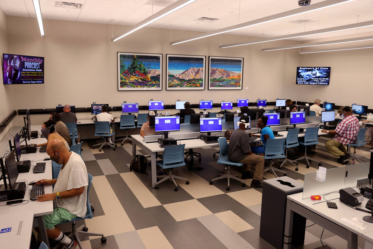 People use the computer room at the East Las Vegas Library Monday, Aug. 9, 2021. (K.M. Cannon/L ...