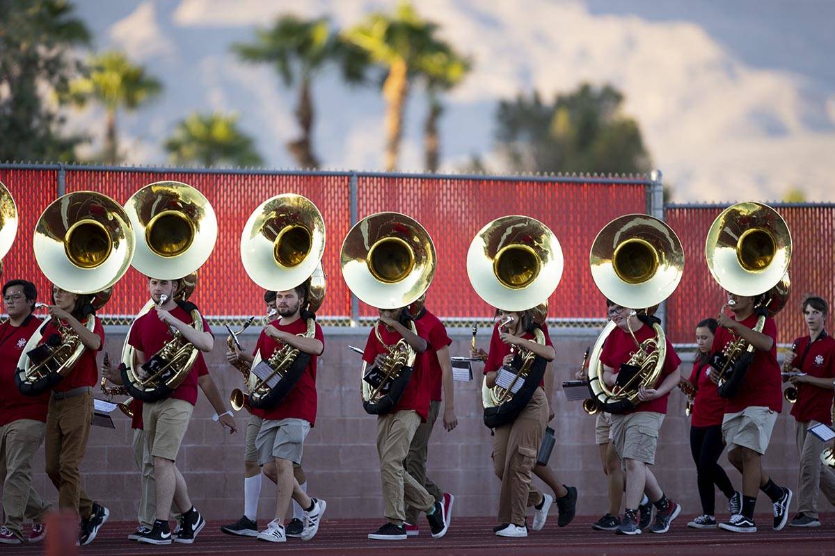 The Arbor View High School band take the field before a home football game against Faith Luther ...