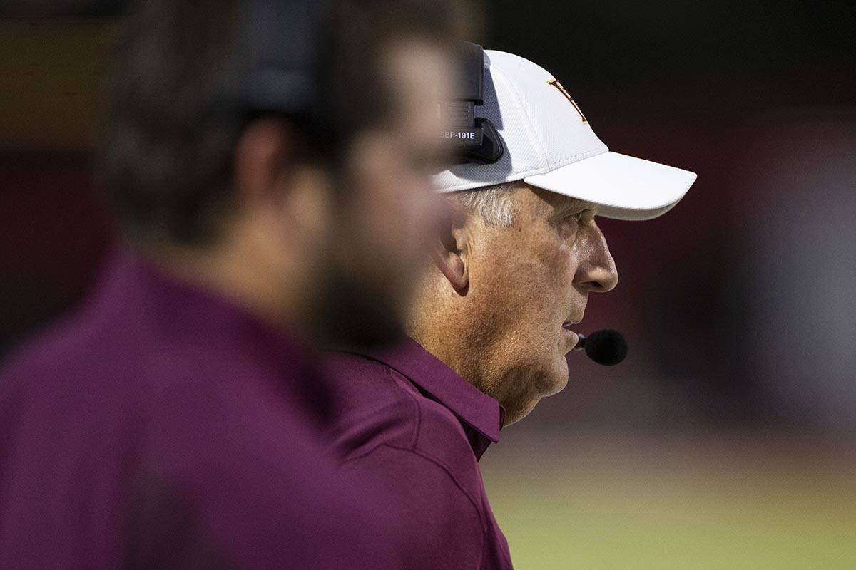 Faith Lutheran's head coach Mike Sandford watches his team play Arbor View during the first hal ...