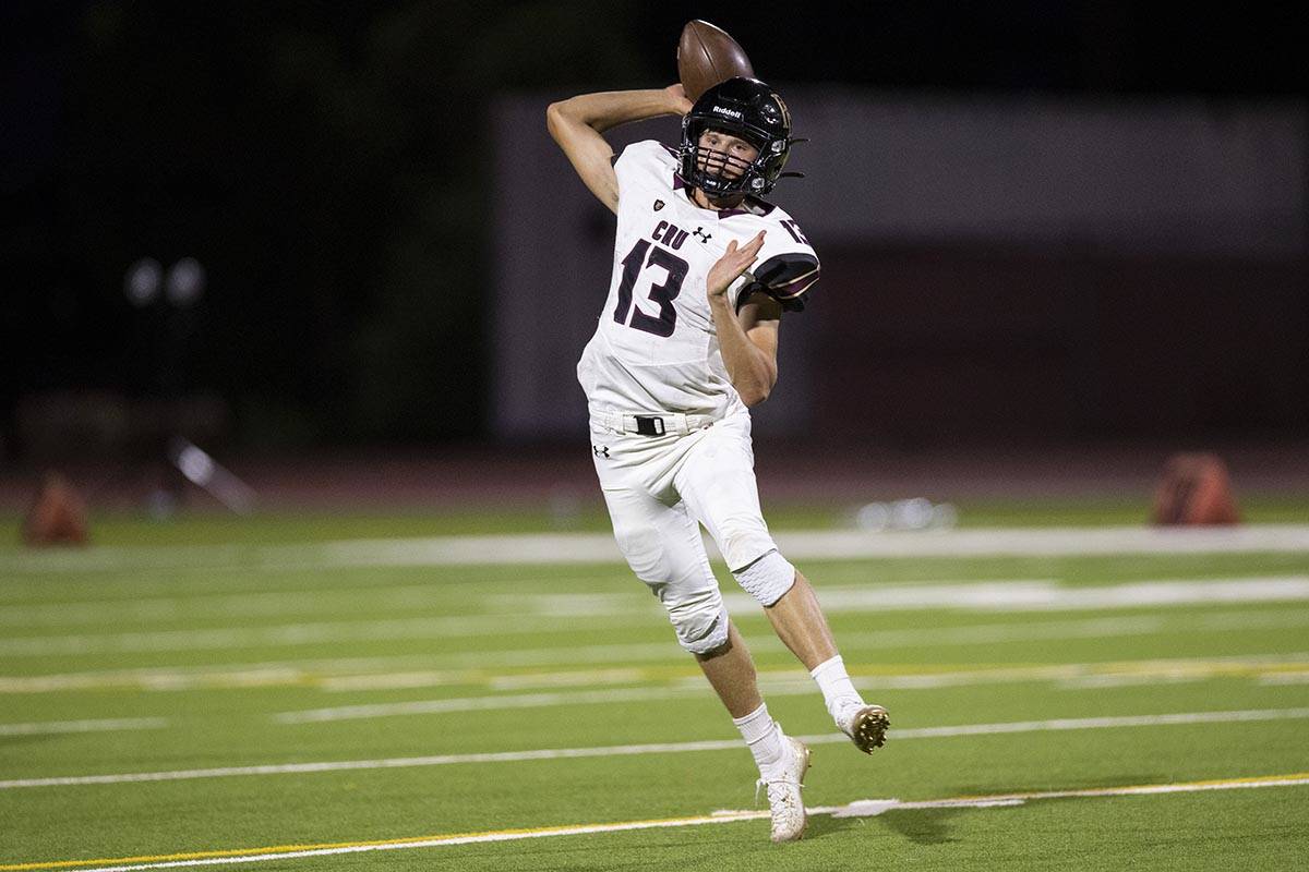 Faith Lutheran's Rylan Walter (13) throws a pass during the second quarter of football game aga ...