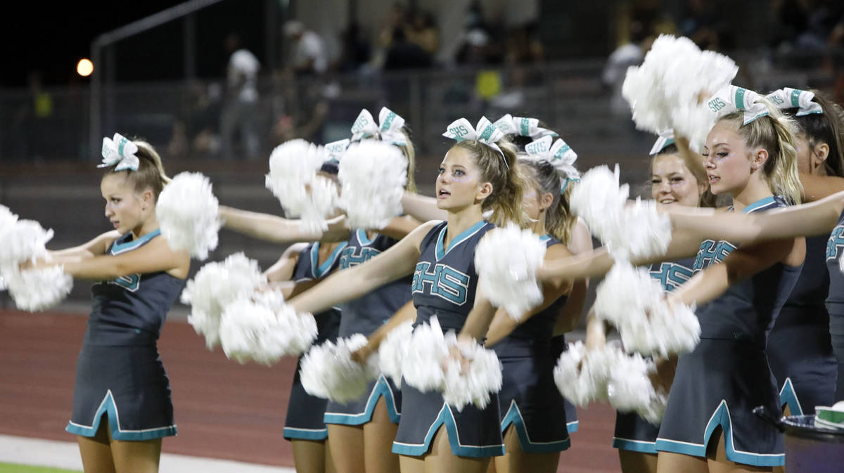 Silverado High School's cheerleaders celebrate their victory against Shadow Ridge High School a ...