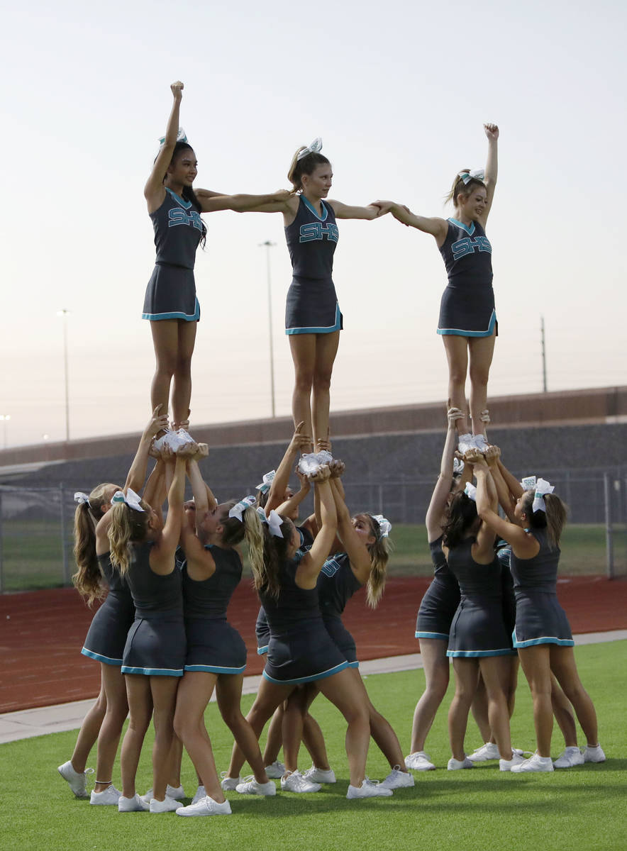 Silverado High School's cheerleaders perform during a football game against Shadow Ridge High S ...