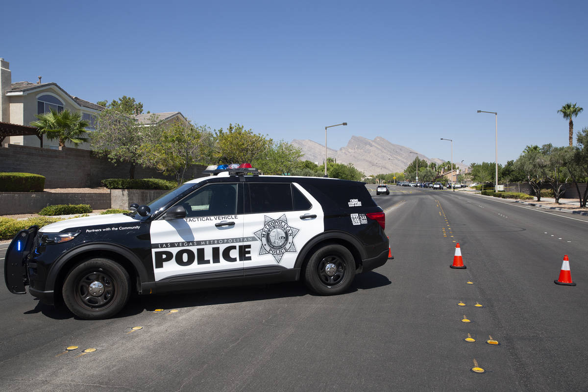 Metropolitan police investigate a homicide in the 10000 block of Kenton Place on Friday, Aug. 2 ...