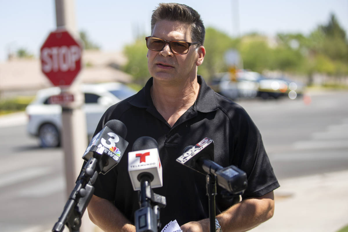 Lt. David Valenta gives the media a briefing on the investigation of a homicide that occurred i ...