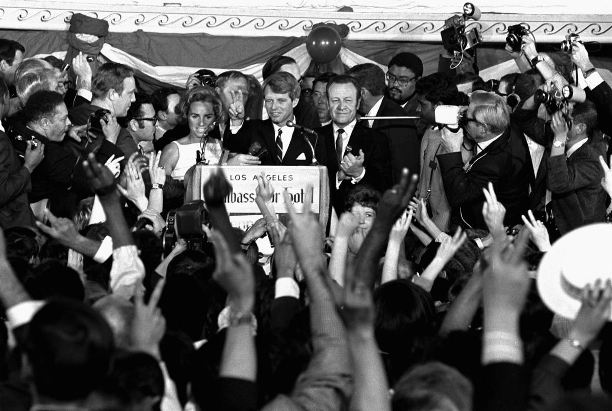 FILE - In this June 5, 1968, file photo, Sen. Robert F. Kennedy addresses campaign workers mome ...