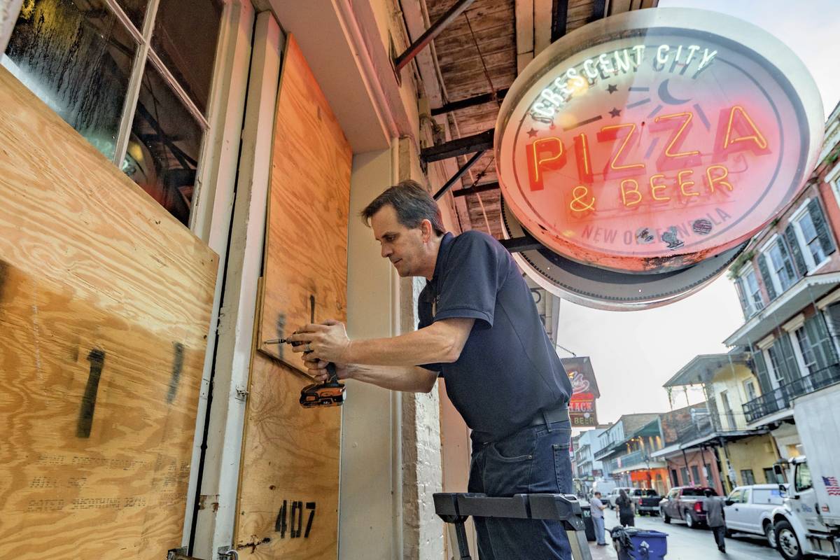 Michael Richard of Creole Cuisine Restaurant Concepts boards up Crescent City Pizza on Bourbon ...