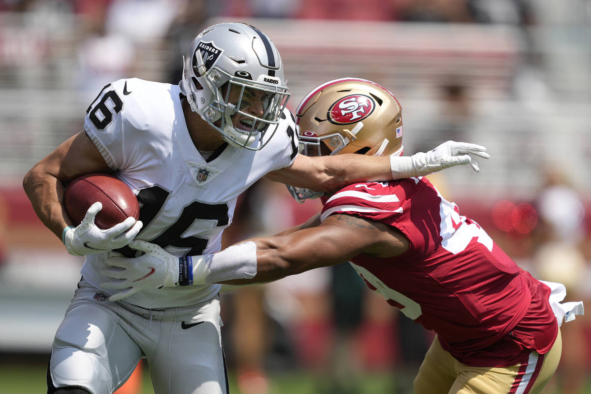 Las Vegas Raiders' Dillon Stoner (16) runs against San Francisco 49ers' Elijah Mitchell an NFL ...