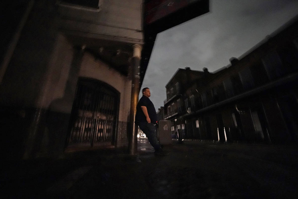Greg Nazarko, manager of the Bourbon Bandstand bar on Bourbon Street, leans against a pole outs ...