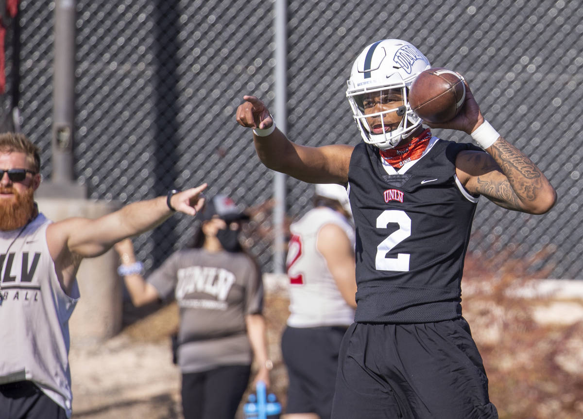 UNLV quarterback Doug Brumfield (2) gives directions to a receiver during the first spring foot ...
