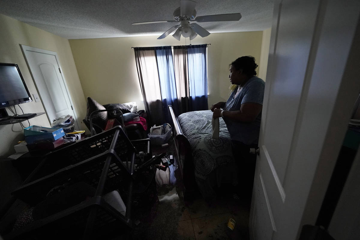 Jerilyn Collins returns to her destroyed home with the assistance of the Louisiana National Gua ...