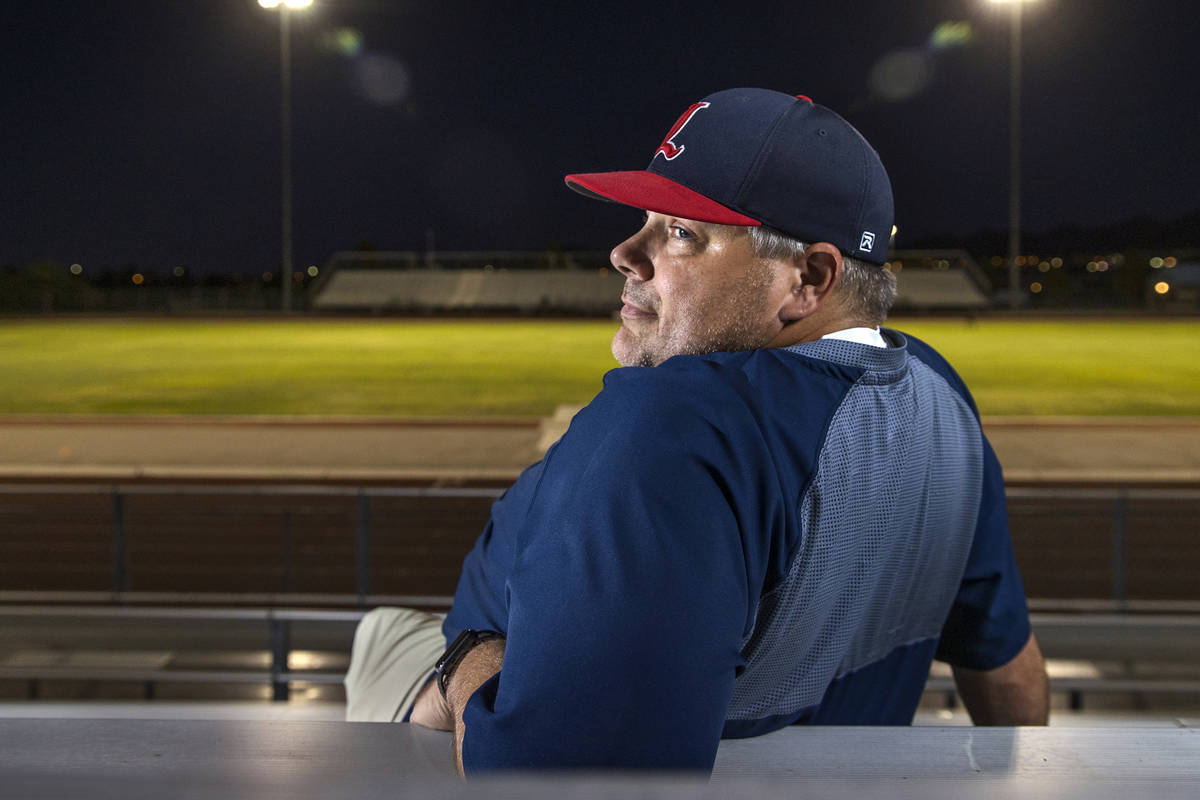 Liberty High School football coach Rich Muraco in the stands on the empty football field on Thu ...