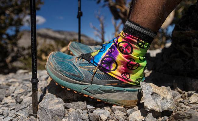 52 Peaks hiker Vince Nihonjin sticks his poles in the ground at the top of Fletcher Peak at Mou ...